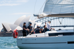 corporate workers are sailing with Sydney By Sail for their team building activity