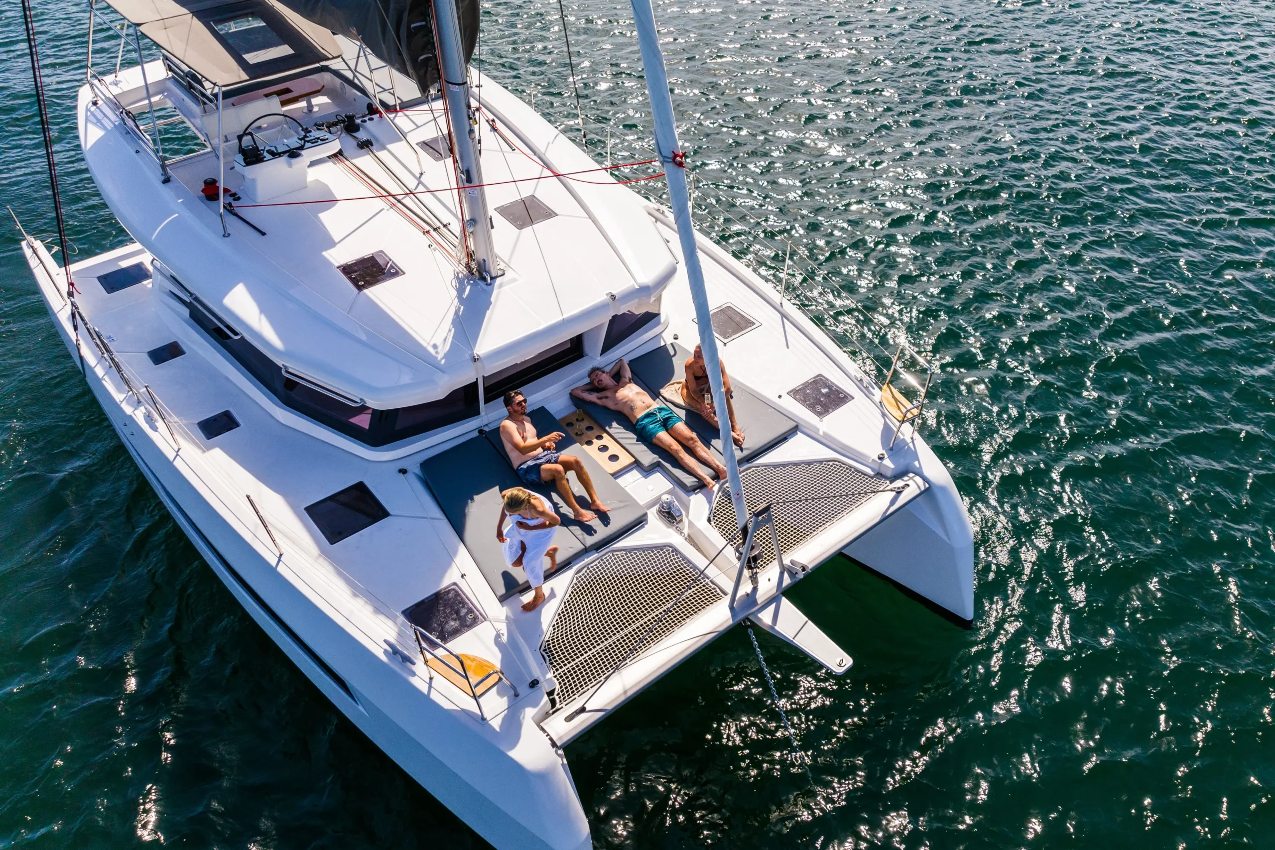 Enjoying catamaran with friends